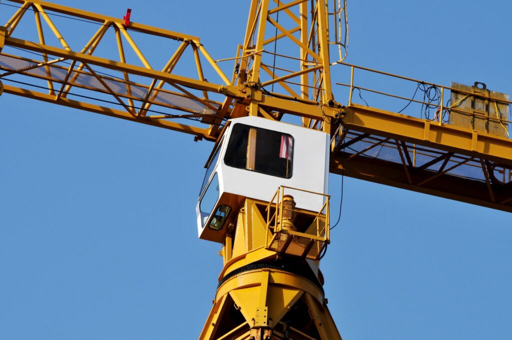 Tower crane operator in working clothes