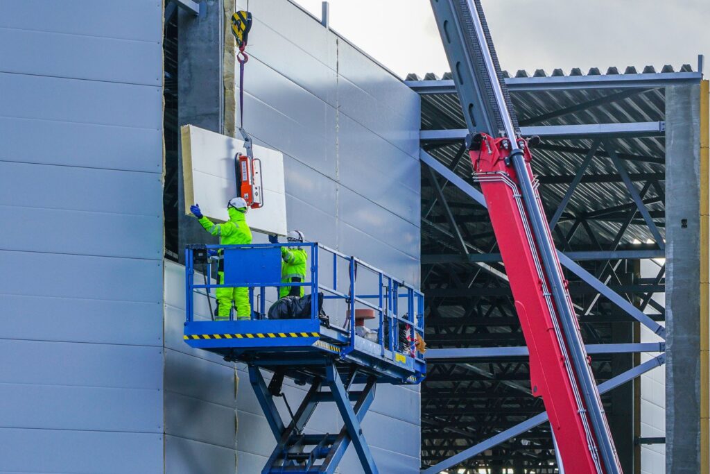 workers on the mobile platform