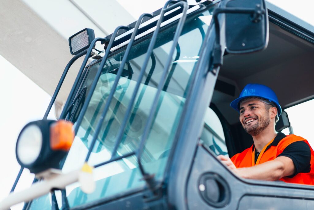 crane operator moves a load