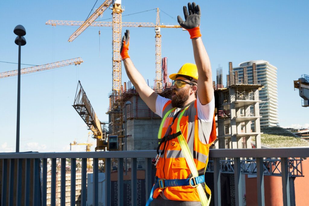 the hook signals the crane operator