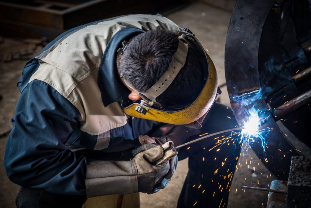 welding machine used by a man at home