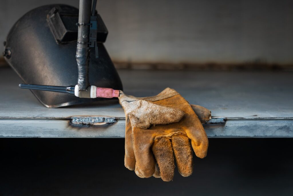 welder's gloves and mask