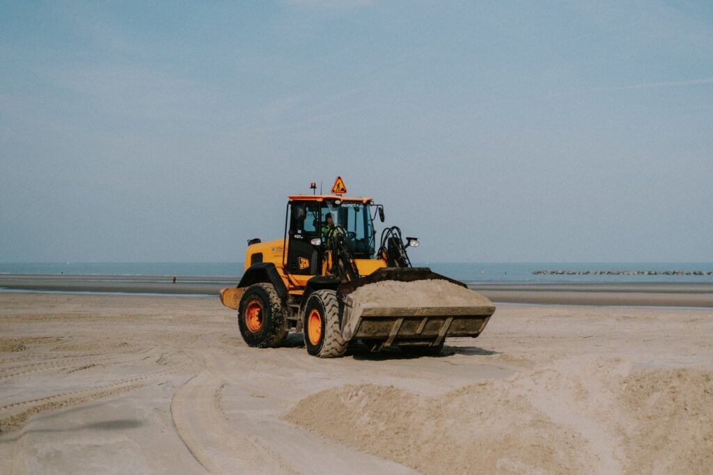 Excavator in the process of moving soil