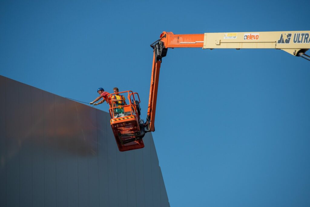 workers on the mobile platform