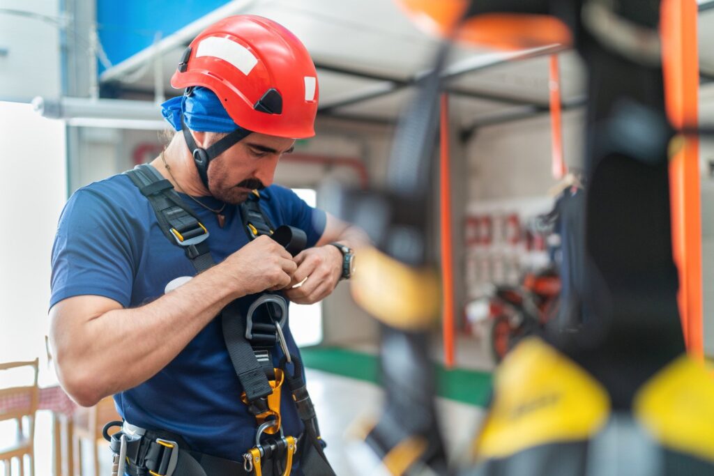 Person installs temporary belay point