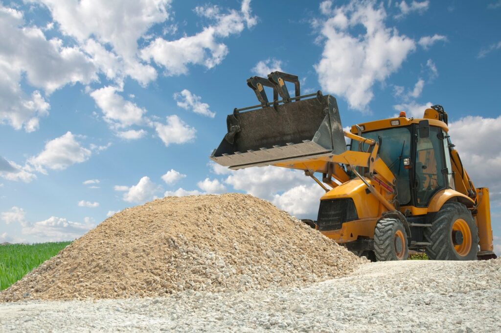 Excavator on road works